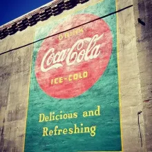 Painting of Coca Cola on a wall